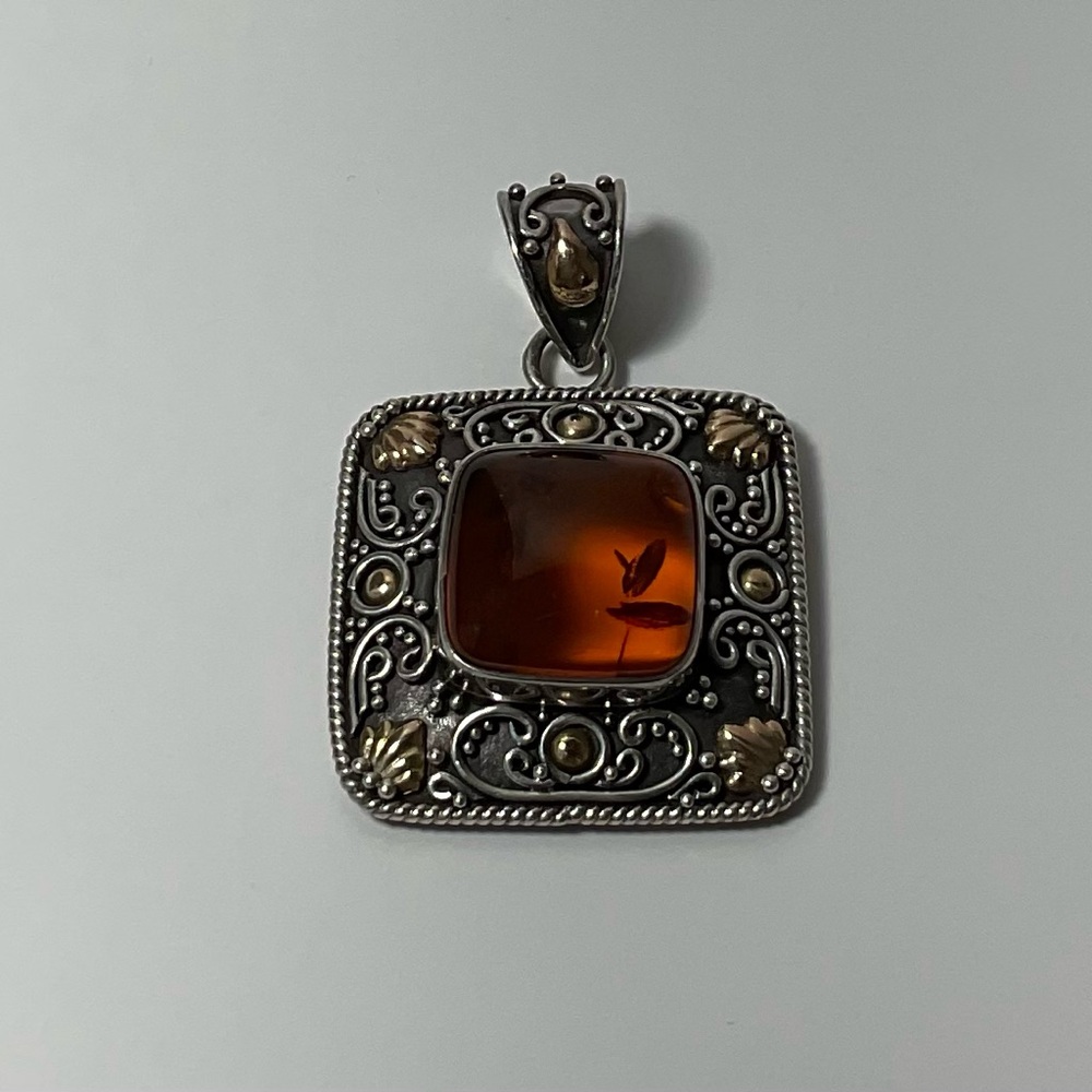 Elegant Silver and Amber Pendant
